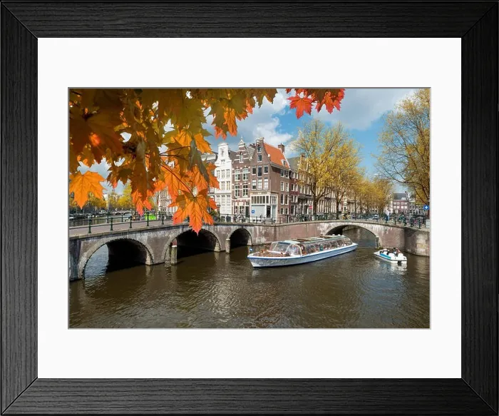 Framed Print : Traditional old houses on canal at fall day in Amsterdam, Netherlands at autumn season Framed Print : Traditional old houses on canal at fall day in Amsterdam, Netherlands at autumn season