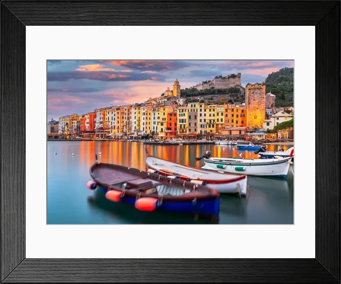 Framed Print : Porto Venere, La Spezia, Italy historic town skyline with Christmas lights at dusk Framed Print : Porto Venere, La Spezia, Italy historic town skyline with Christmas lights at dusk