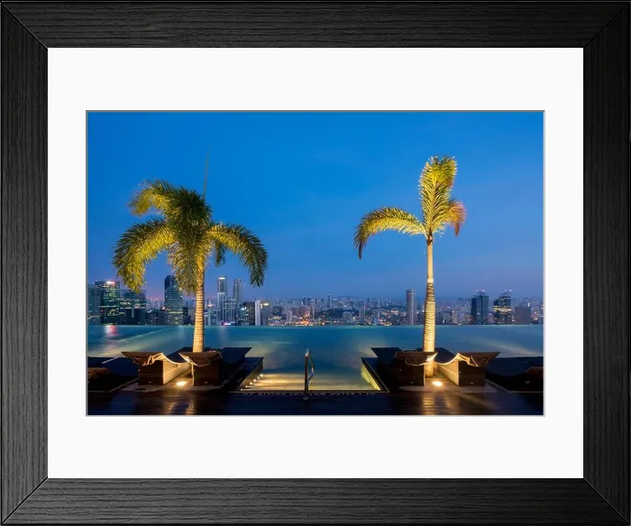 Framed Print : Swimming Pool on roof top and Singapore city skyline in night, Sinagpore Framed Print : Swimming Pool on roof top and Singapore city skyline in night, Sinagpore
