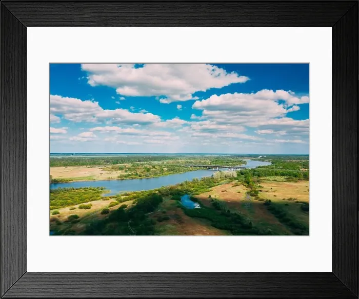 Framed Print : Rechytsa, Gomel Region, Belarus. Aerial View Of Dnieper River. Sunny Sky Above Green Meadow And River Landscape. Top View Of European Nature From High