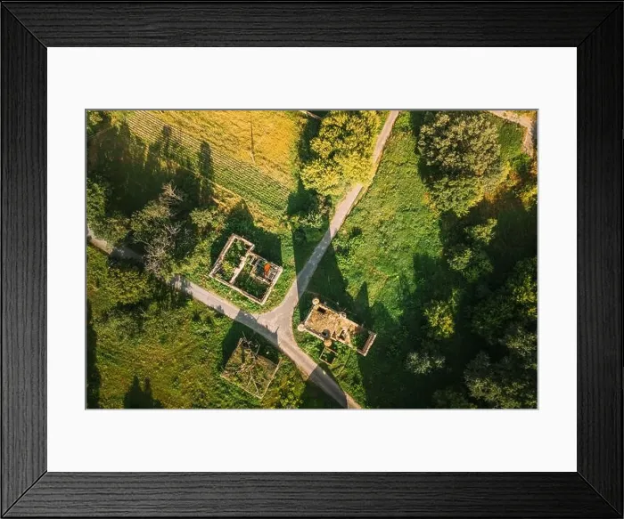 Framed Print : Aerial View Remains Of Yastrzhembsky Estate And Park Complex. Top View Of Old Five-storey Brick Water Tower. Drone View Of Beautiful European Nature