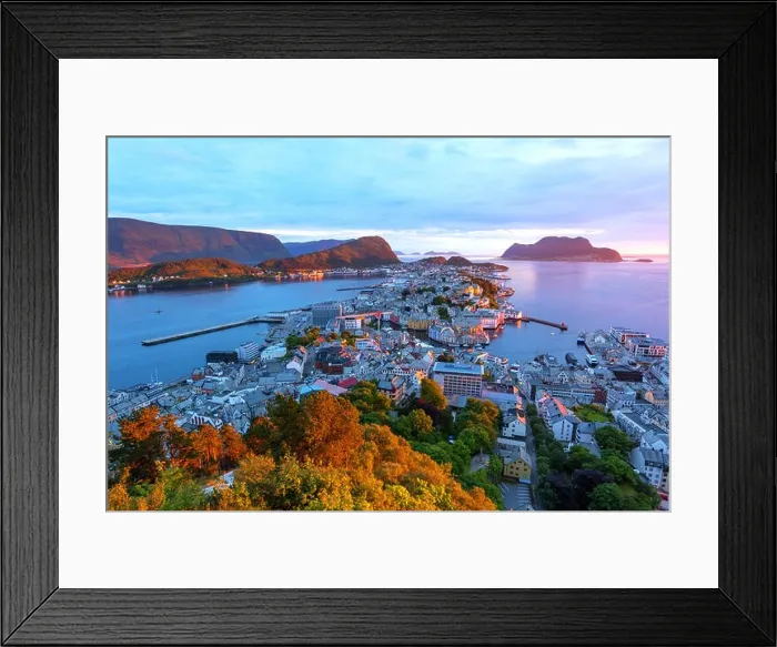 Framed Print : Colorful sunset in Alesund port town on western coast of Norway. Place where the ocean meet the mountains