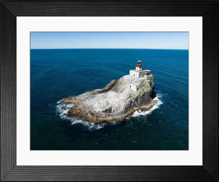 Framed Print : The Pacific Ocean surrounds the deactivated Tillamook Rock Lighthouse off the scenic Oregon coast. The historic lighthouse was built in 1880