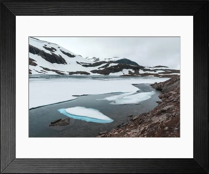 Framed Print : Typical norwegian landscape with snowy mountains and clear lake near the famous Aurlandsvegen (Bjorgavegen), mountain road, Aurland, Norway