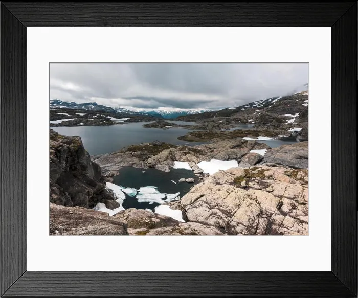 Framed Print : Typical norwegian landscape with snowy mountains and clear lake near the famous Aurlandsvegen (Bjorgavegen), mountain road, Aurland, Norway Framed Print : Typical norwegian landscape with snowy mountains and clear lake near the famous Aurlandsvegen (Bjorgavegen), mountain road, Aurland, Norway