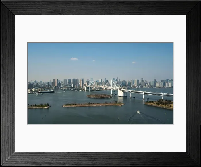 Framed Print : Tokyo Bay with a view of the Tokyo skyline and Rainbow Bridge in tokyo, Japan Framed Print : Tokyo Bay with a view of the Tokyo skyline and Rainbow Bridge in tokyo, Japan