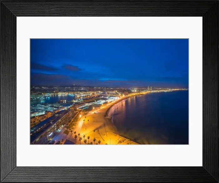 Framed Print : Aerial view of Barcelona Beach in summer night along seaside in Barcelona, Spain. Mediterranean Sea in Spain Framed Print : Aerial view of Barcelona Beach in summer night along seaside in Barcelona, Spain. Mediterranean Sea in Spain