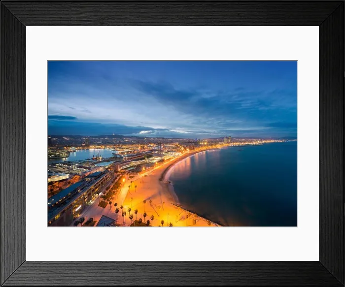 Framed Print : Aerial view of Barcelona Beach in summer night along seaside in Barcelona, Spain. Mediterranean Sea in Spain Framed Print : Aerial view of Barcelona Beach in summer night along seaside in Barcelona, Spain. Mediterranean Sea in Spain