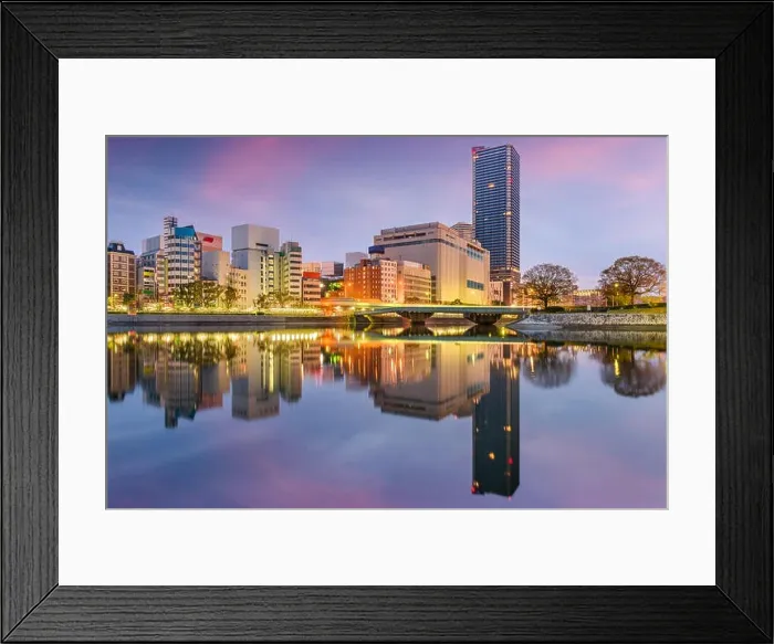 Framed Print : Hiroshima, Japan city skyline on the river at twilight