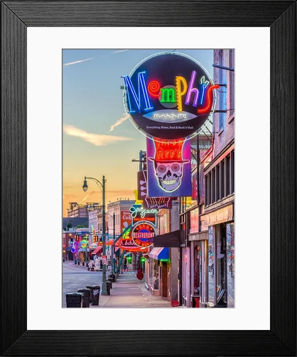 Framed Print : MEMPHIS, TENNESSEE - AUGUST 25, 2017: Blues Clubs on historic Beale Street at twilight Framed Print : MEMPHIS, TENNESSEE - AUGUST 25, 2017: Blues Clubs on historic Beale Street at twilight