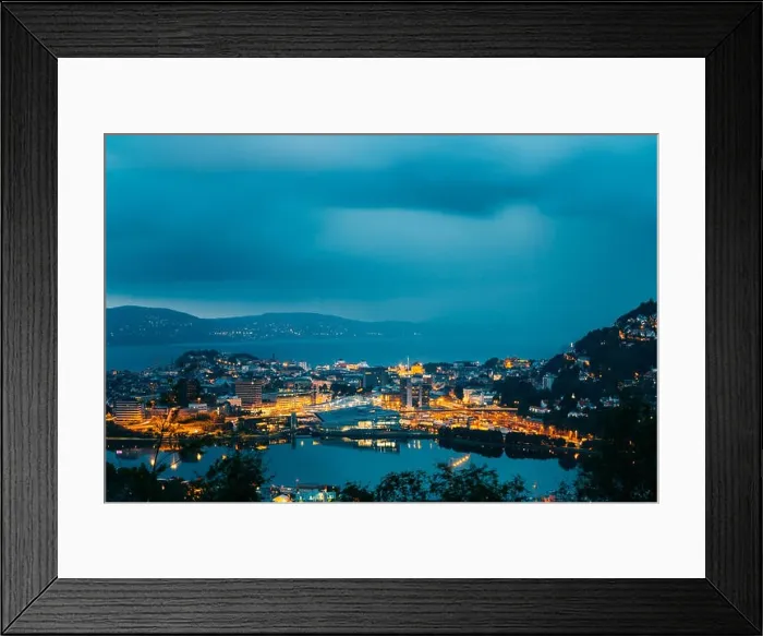 Framed Print : Bergen, Norway. Aerial View Cityscape Of Bergen And Harbor From Mountain Top In Blue Hour. City In Summer Evening Or Night Illuminations Lighting Framed Print : Bergen, Norway. Aerial View Cityscape Of Bergen And Harbor From Mountain Top In Blue Hour. City In Summer Evening Or Night Illuminations Lighting