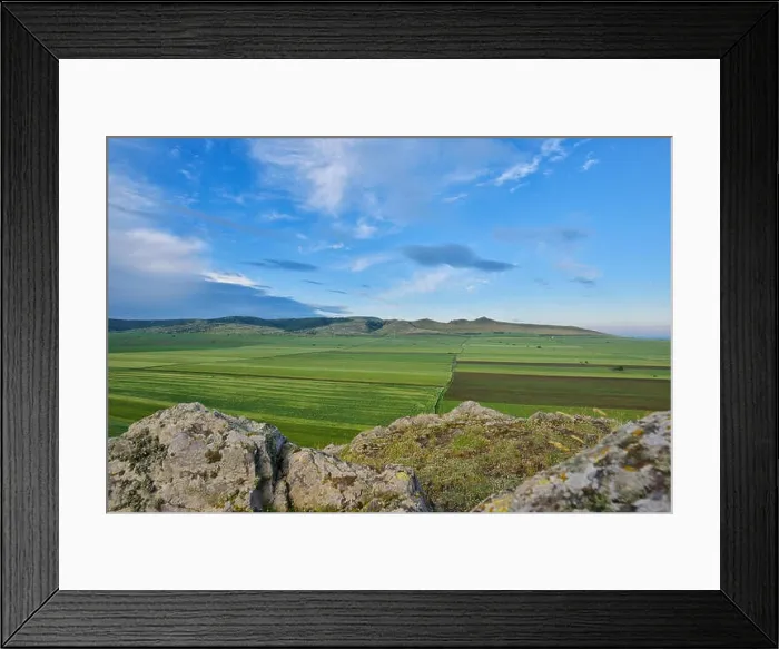 Framed Print : Agricultural landscape with hills under a blue summer sky Framed Print : Agricultural landscape with hills under a blue summer sky