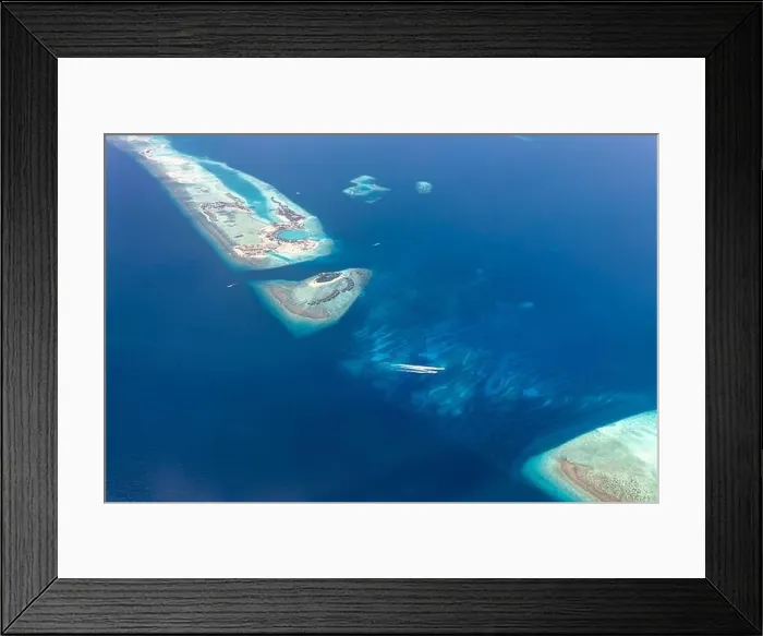 Framed Print : Beauty tropical island. Aerial view on tropical islands in the Indian ocean, atolls with coral reef. Exotic seascape aerial landscape Framed Print : Beauty tropical island. Aerial view on tropical islands in the Indian ocean, atolls with coral reef. Exotic seascape aerial landscape