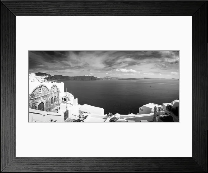 Framed Print : Black and white image of white architecture in Santorini Oia, Greece. Monochrome travel landscape. Dramatic process, Aegean sea in black and white Framed Print : Black and white image of white architecture in Santorini Oia, Greece. Monochrome travel landscape. Dramatic process, Aegean sea in black and white