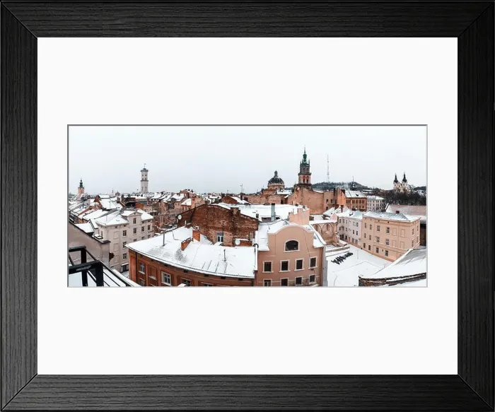 Framed Print : Lviv in winter time. Picturesque view on Lviv city center from top of old roof. Eastern Europe, Ukraine Framed Print : Lviv in winter time. Picturesque view on Lviv city center from top of old roof. Eastern Europe, Ukraine