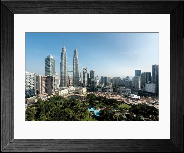 Framed Print : Kuala Lumpur skyline and skyscraper in Malaysia. Downtown business district center of Kuala lumpur seeing Petronas twin tower in Malaysia. Asia Framed Print : Kuala Lumpur skyline and skyscraper in Malaysia. Downtown business district center of Kuala lumpur seeing Petronas twin tower in Malaysia. Asia