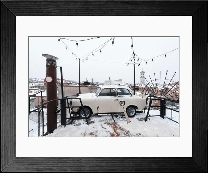 Framed Print : Lviv in winter time. Picturesque view on Lviv city center from top of old roof of restaurant House of legend. Eastern Europe, Ukraine Framed Print : Lviv in winter time. Picturesque view on Lviv city center from top of old roof of restaurant House of legend. Eastern Europe, Ukraine