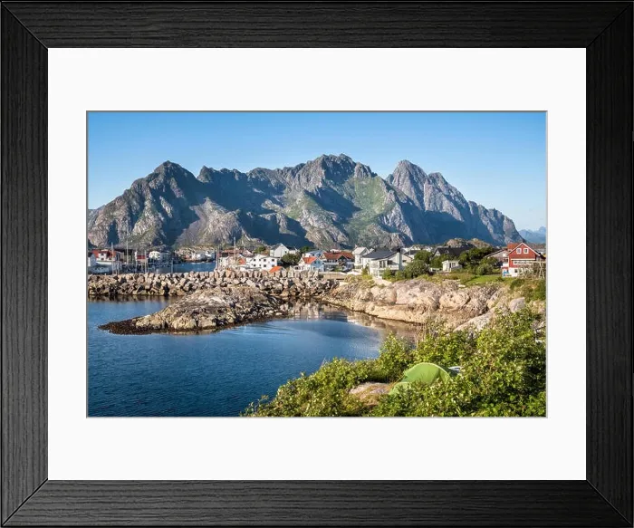 Framed Print : Scenic view from idyllic village with mountains at bright summer day in Henningsvaer, Lofoten, Norway Framed Print : Scenic view from idyllic village with mountains at bright summer day in Henningsvaer, Lofoten, Norway