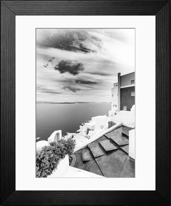 Framed Print : Black and white image of white architecture in Santorini Oia, Greece. Monochrome travel landscape. Dramatic process, Aegean sea in black and white Framed Print : Black and white image of white architecture in Santorini Oia, Greece. Monochrome travel landscape. Dramatic process, Aegean sea in black and white