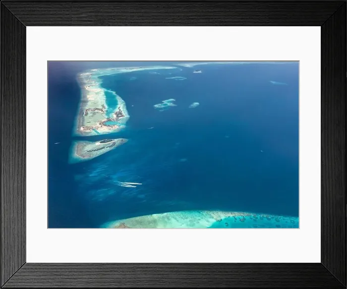 Framed Print : Aerial view on tropical islands. Aerial photo of beautiful paradise Maldives tropical beach on island. Summer and travel vacation concept Framed Print : Aerial view on tropical islands. Aerial photo of beautiful paradise Maldives tropical beach on island. Summer and travel vacation concept