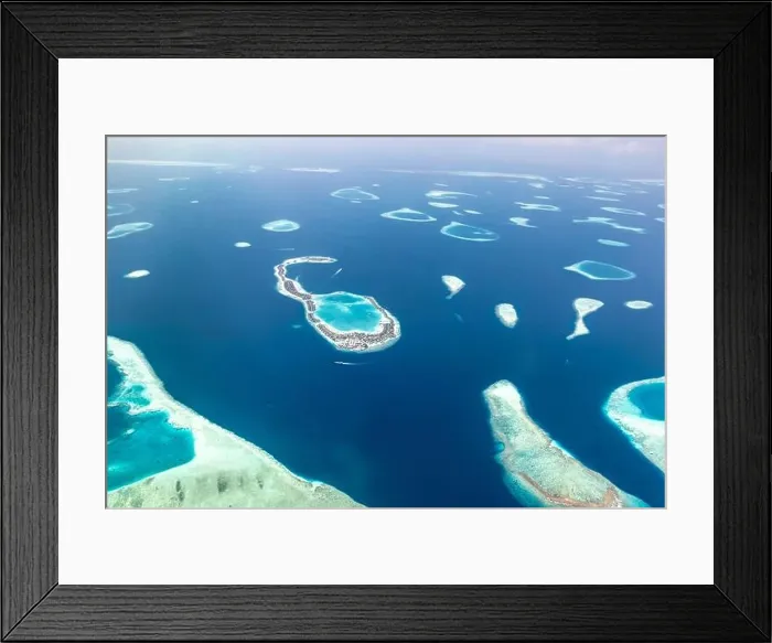 Framed Print : Aerial view on tropical islands. Aerial photo of beautiful paradise Maldives tropical beach on island. Summer and travel vacation concept Framed Print : Aerial view on tropical islands. Aerial photo of beautiful paradise Maldives tropical beach on island. Summer and travel vacation concept
