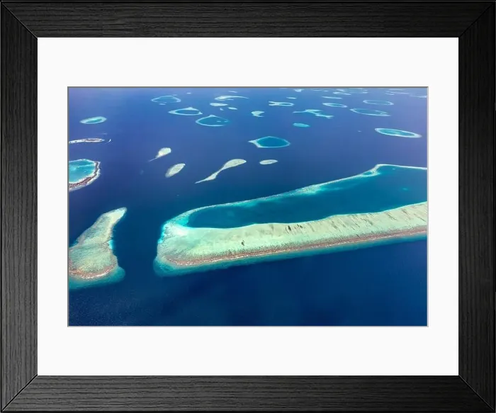 Framed Print : Aerial view on tropical islands. Aerial photo of beautiful paradise Maldives tropical beach on island. Summer and travel vacation concept Framed Print : Aerial view on tropical islands. Aerial photo of beautiful paradise Maldives tropical beach on island. Summer and travel vacation concept