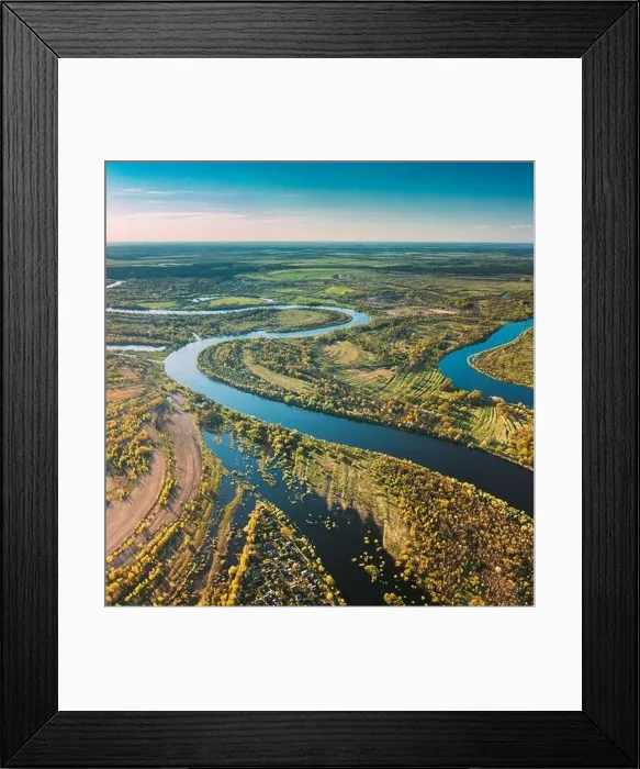 Framed Print : Village Near River, Aerial View Green Forest Woods And River Landscape In Sunny Spring Summer Day. Top View Of Nature, Bird's Eye View. Trees Standing Framed Print : Village Near River, Aerial View Green Forest Woods And River Landscape In Sunny Spring Summer Day. Top View Of Nature, Bird's Eye View. Trees Standing