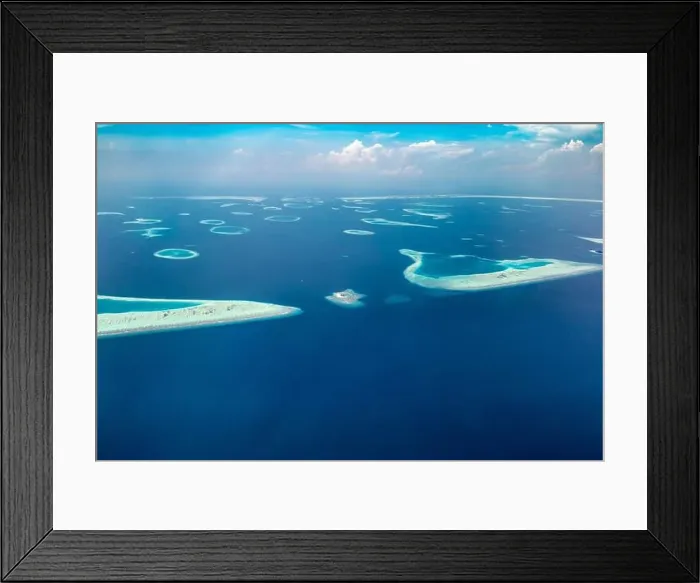 Framed Print : Aerial view on tropical islands. Aerial photo of beautiful paradise Maldives tropical beach on island. Summer and travel vacation concept Framed Print : Aerial view on tropical islands. Aerial photo of beautiful paradise Maldives tropical beach on island. Summer and travel vacation concept