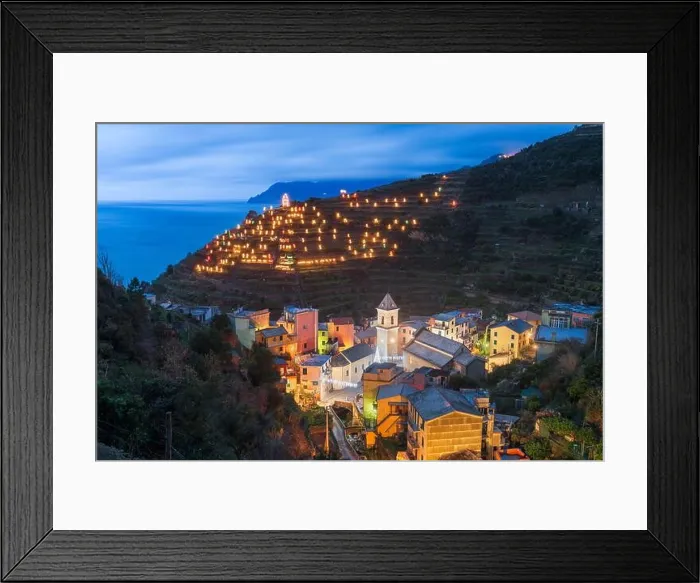 Framed Print : Manarola, Italy in the Cinque Terre Region during Christmas season with illumination at dusk Framed Print : Manarola, Italy in the Cinque Terre Region during Christmas season with illumination at dusk