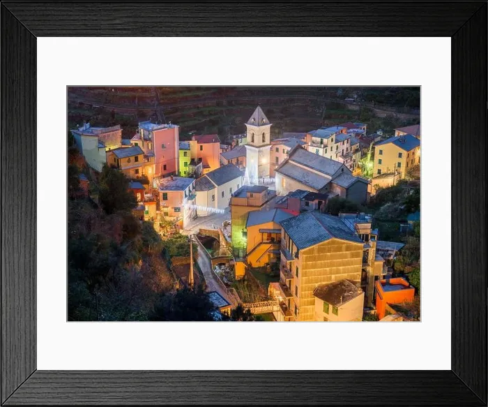 Framed Print : Manarola, Italy in the Cinque Terre Region during Christmas season with illumination at dusk Framed Print : Manarola, Italy in the Cinque Terre Region during Christmas season with illumination at dusk