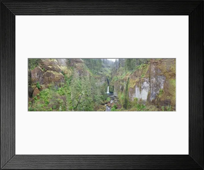 Framed Print : A scenic river flows over a waterfall and into the Columbia River Gorge, Oregon. This beautiful area is known for its waterfalls and forests