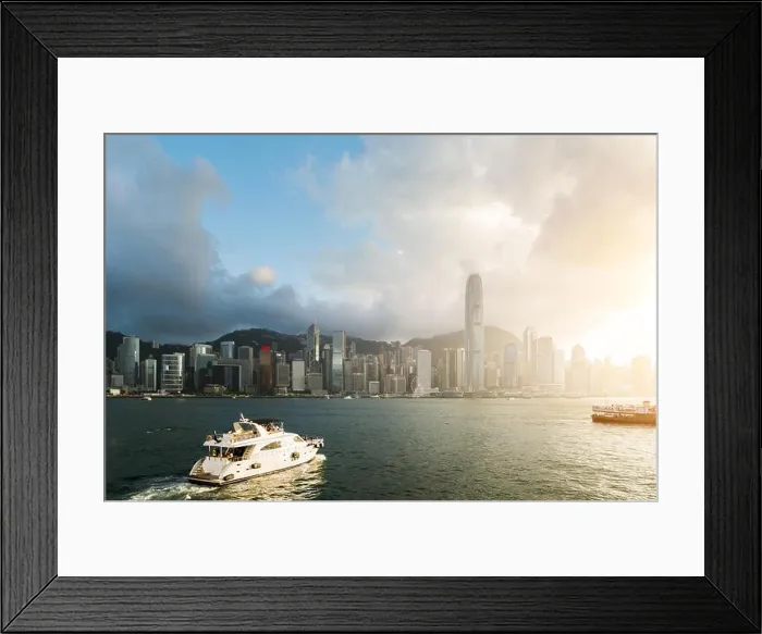 Framed Print : View of Victoria Harbour with Hong Kong skyscraper office buildings and cruise ship at sunset time in Hong Kong. Asia Framed Print : View of Victoria Harbour with Hong Kong skyscraper office buildings and cruise ship at sunset time in Hong Kong. Asia