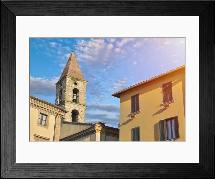 Framed Print : Close-up of colorful buildings, bell tower and rooftops in a blue sunny day at Umbertide, a gracious little town near Perugia, Italy