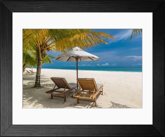 Framed Print : Beautiful tropical beach. White sand and coco palms chairs, umbrella travel tourism, amazing beach landscape. Luxury island resort vacation or holiday Framed Print : Beautiful tropical beach. White sand and coco palms chairs, umbrella travel tourism, amazing beach landscape. Luxury island resort vacation or holiday