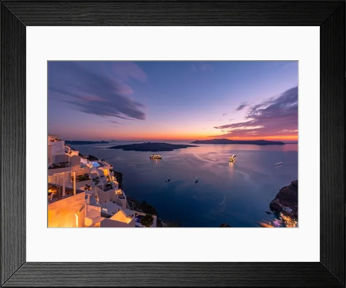 Framed Print : Amazing evening view of Santorini island. Romantic sunset sunrise summer travel destination. Gorgeous sunset sky, white architecture, led lights Framed Print : Amazing evening view of Santorini island. Romantic sunset sunrise summer travel destination. Gorgeous sunset sky, white architecture, led lights