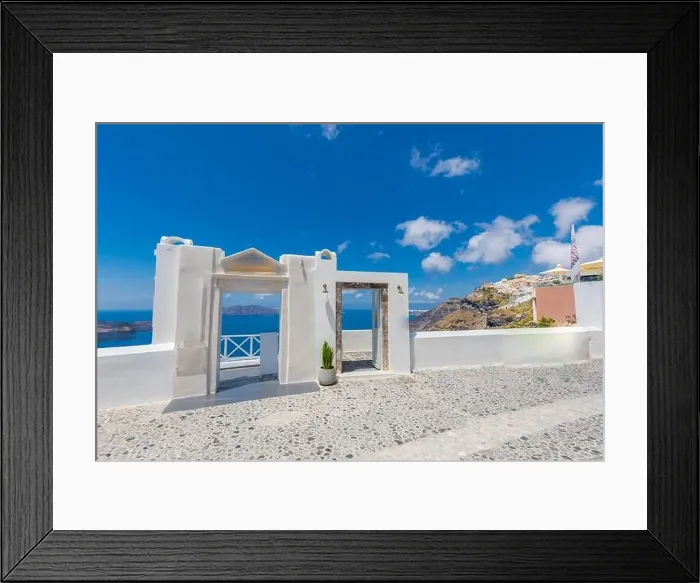 Framed Print : Santorini Island, Greece. Traditional Greek door with a great view. Amazing seascape over cliff with wooden door and traditional white architecture Framed Print : Santorini Island, Greece. Traditional Greek door with a great view. Amazing seascape over cliff with wooden door and traditional white architecture