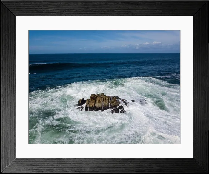Framed Print : Powerful swells from the Pacific Ocean crash against the rocks just off the coastline of the Monterey peninsula in California Framed Print : Powerful swells from the Pacific Ocean crash against the rocks just off the coastline of the Monterey peninsula in California