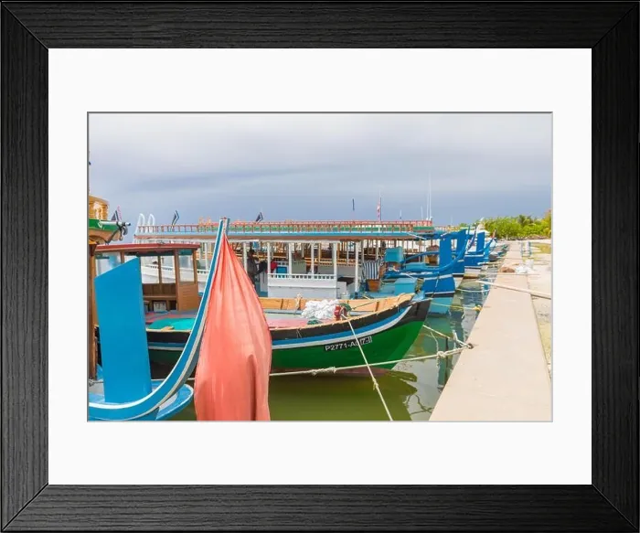 Framed Print : NORTH MALE, MALDIVES -6 JUL 2019 - View of a Dhoni, a traditional Maldivian wooden fishing boat on the water on Furanafushi Island, North Malé Atol Framed Print : NORTH MALE, MALDIVES -6 JUL 2019 - View of a Dhoni, a traditional Maldivian wooden fishing boat on the water on Furanafushi Island, North Malé Atol