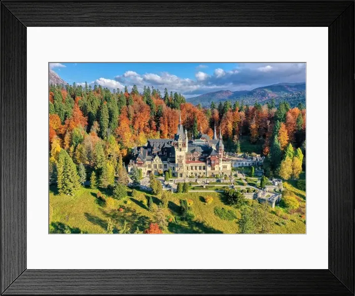 Framed Print : Peles Castle, Sinaia, Prahova County, Romania: Drone view of famous Neo-Renaissance castle in autumn colours, at the base of the Carpathian Mountains
