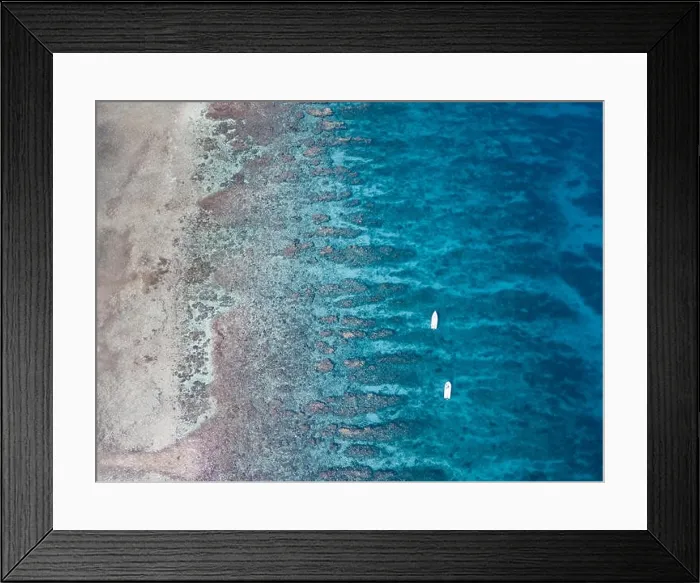 Framed Print : An aerial view of a beautiful coral reef on the edge of Turneffe Atoll off the coast of Belize. This area of the Caribbean is extremely biodiverse