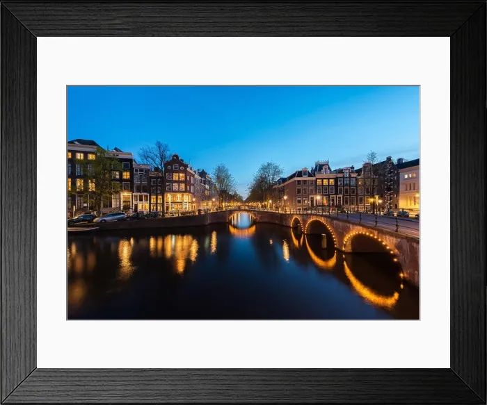 Framed Print : Canals of Amsterdam at night. Amsterdam is the capital and most populous city of the Netherlands Framed Print : Canals of Amsterdam at night. Amsterdam is the capital and most populous city of the Netherlands
