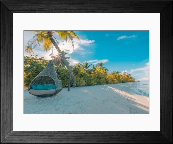 Framed Print : Tropical beach background as summer landscape with beach swing or hammock and white sand and calm sea for beach banner. Perfect beach scene vacation Framed Print : Tropical beach background as summer landscape with beach swing or hammock and white sand and calm sea for beach banner. Perfect beach scene vacation