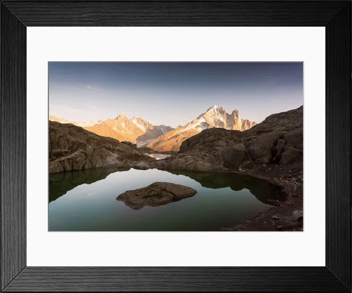 Framed Print : Colourful sunset on Lac Blanc lake in France Alps. Monte Bianco mountain range on background Framed Print : Colourful sunset on Lac Blanc lake in France Alps. Monte Bianco mountain range on background