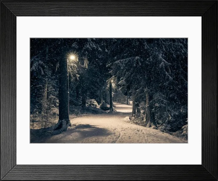 Framed Print : Moody landscape with snow path and light at winter evening in Finland Framed Print : Moody landscape with snow path and light at winter evening in Finland