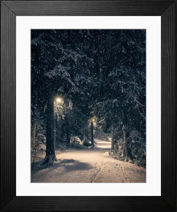 Framed Print : Moody landscape with snow path and light at winter evening in Finland Framed Print : Moody landscape with snow path and light at winter evening in Finland