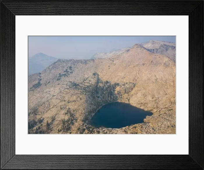 Framed Print : A scenic lake is found amid the wilderness of the Sierra Nevada Mountains. These beautiful granite mountains run along the eastern edge of California Framed Print : A scenic lake is found amid the wilderness of the Sierra Nevada Mountains. These beautiful granite mountains run along the eastern edge of California