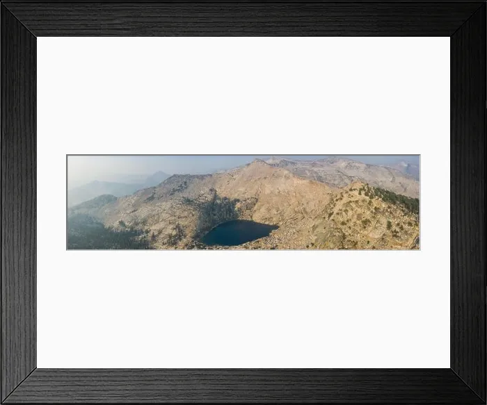 Framed Print : A scenic lake is found amid the wilderness of the Sierra Nevada Mountains. These beautiful granite mountains run along the eastern edge of California