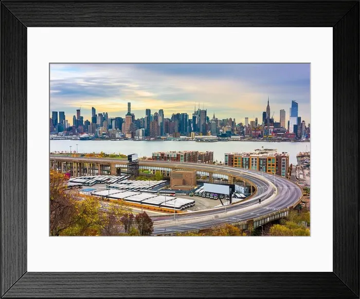 Framed Print : New York, New York, USA cityscape and highways from across the Hudson River at dusk Framed Print : New York, New York, USA cityscape and highways from across the Hudson River at dusk