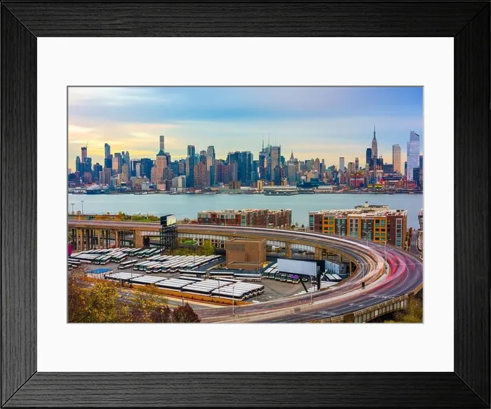 Framed Print : New York, New York, USA cityscape and highways from across the Hudson River at dusk Framed Print : New York, New York, USA cityscape and highways from across the Hudson River at dusk