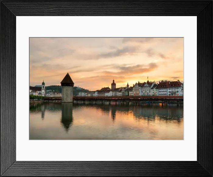 Framed Print : Dramatic sunset over the old town of Lucerne, Chapel Bridge and Water tower in Lucerne, Switzerland Framed Print : Dramatic sunset over the old town of Lucerne, Chapel Bridge and Water tower in Lucerne, Switzerland